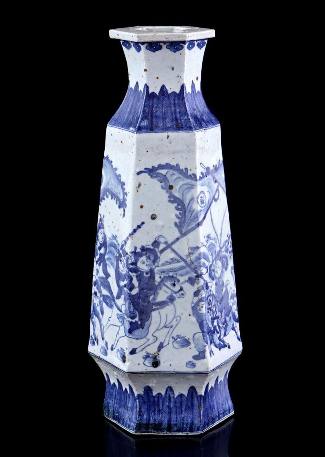 Hexagonal porcelain vase with blue depiction of warriors