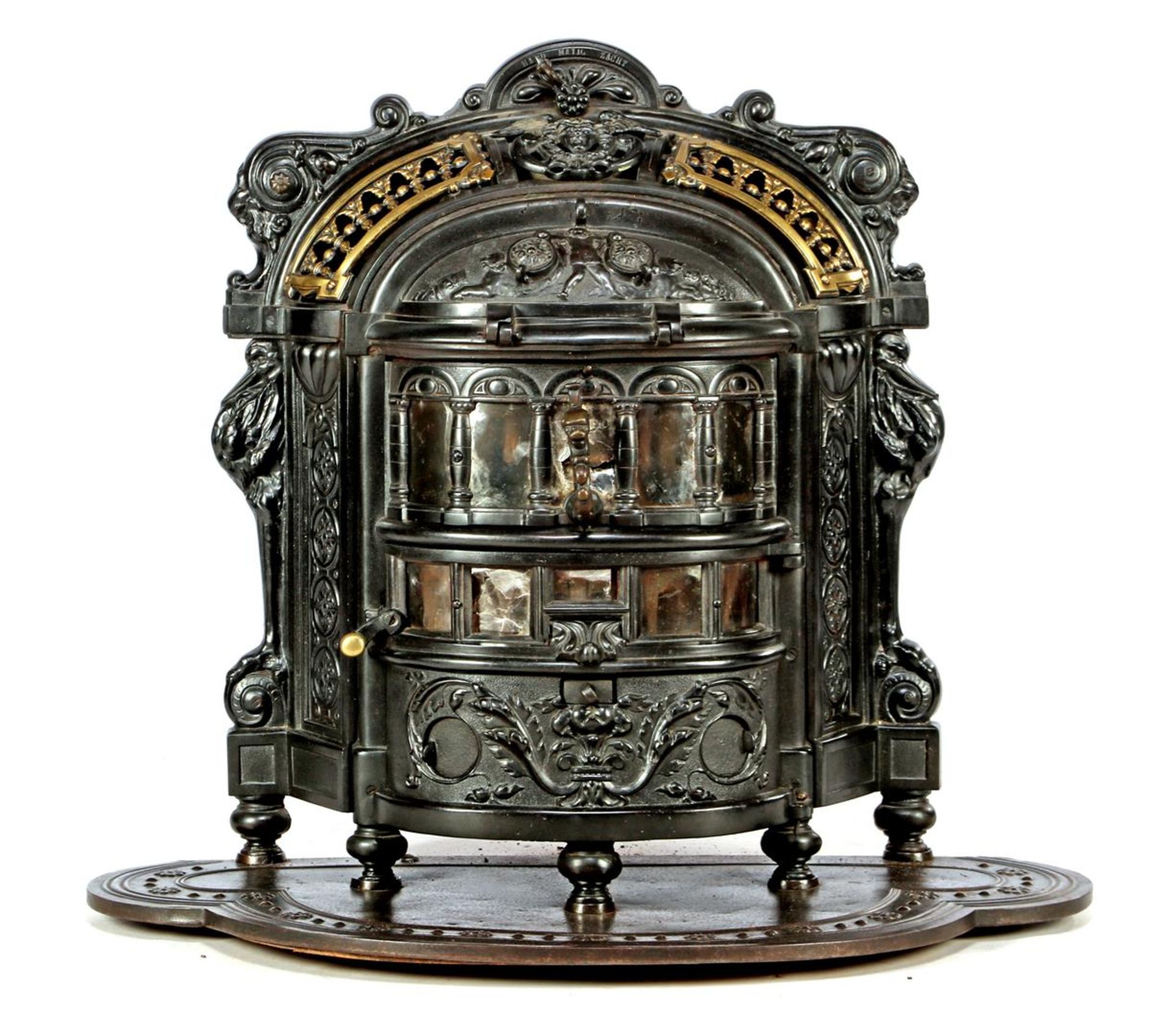 Jaarsma cast iron stove with brass elements