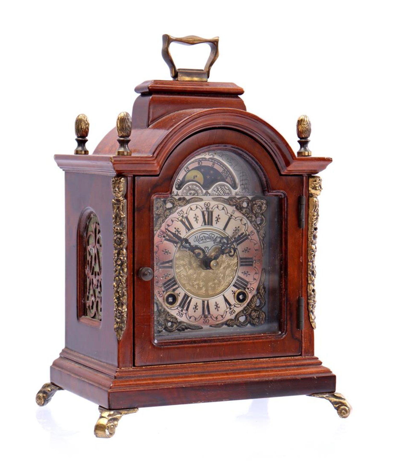 Warmink table clock in walnut cabinet