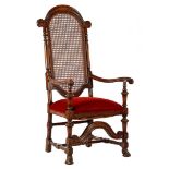 Oak armchair with webbing back and red upholstered seat