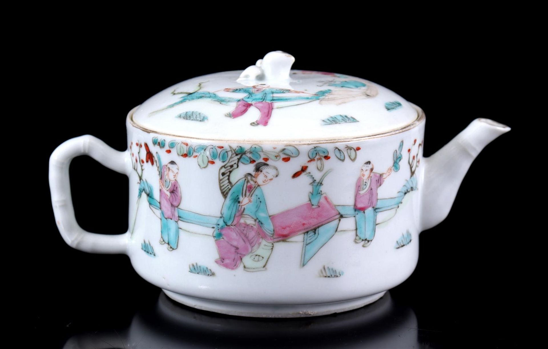 Porcelain teapot with figures playing in the garden 