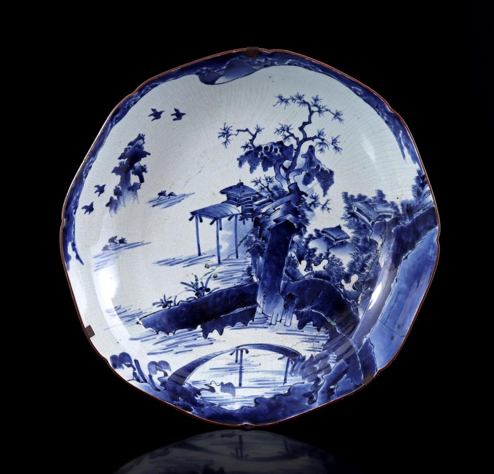 Oriental dish with blue landscape decor, Japan ca. 1775