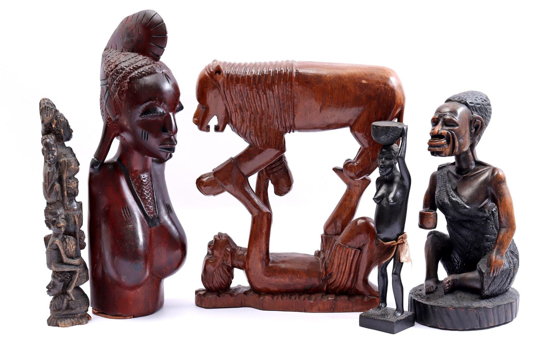 5 wooden African harassed statues
