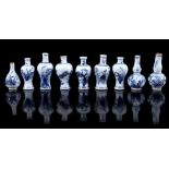 9 porcelain miniature vases with blue and white decor