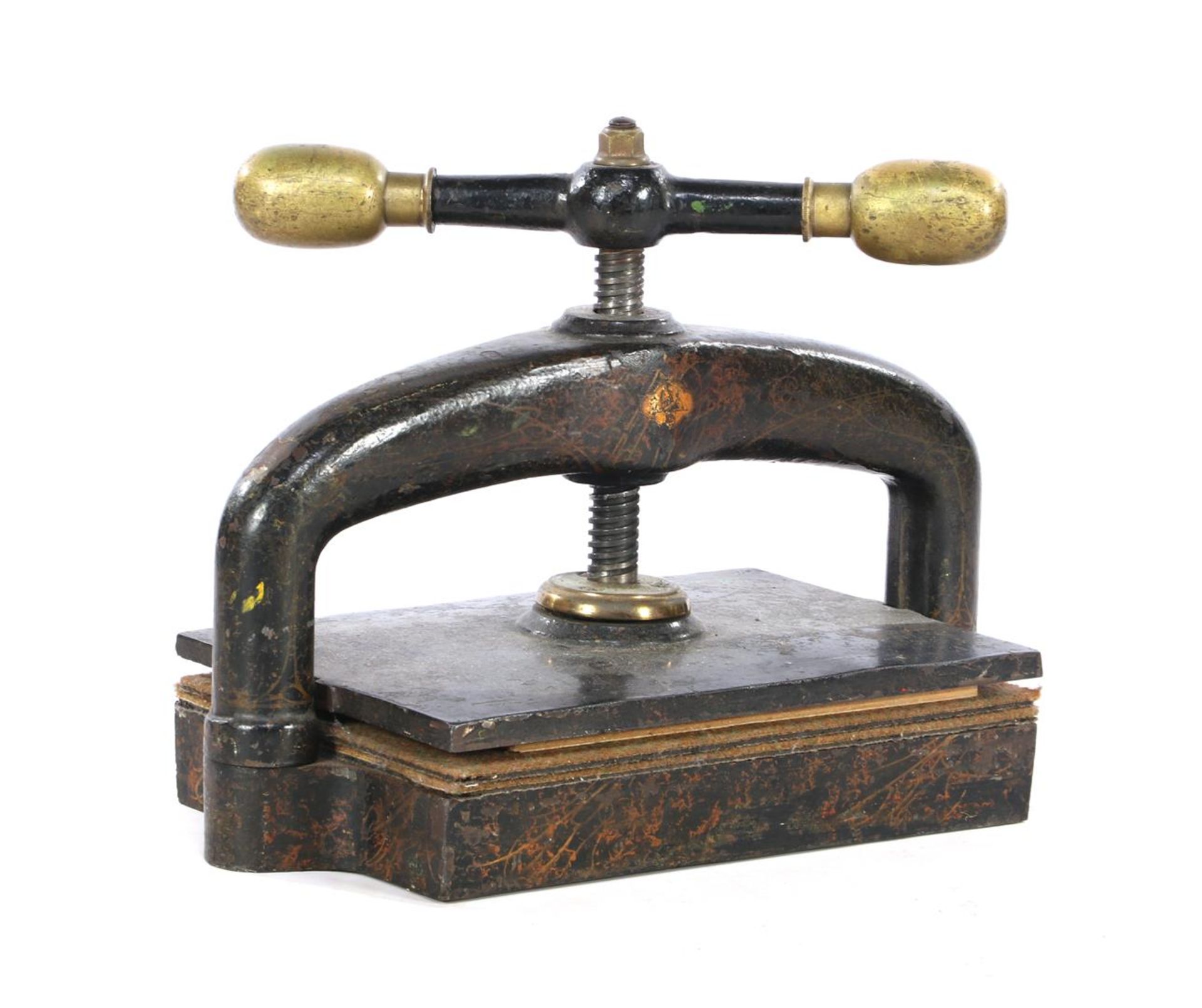 Cast iron book press with brass handles