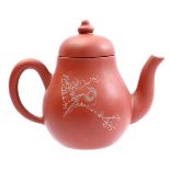 Yixing teapot with engraved decor