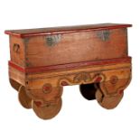 Teak box with stitching and polychrome colours, on wooden wheels