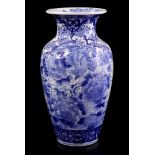 Porcelain vase with blue decor of birds in a floral setting