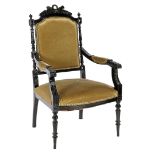 Fired blackened wooden armchair with green upholstery in Louis Seize style