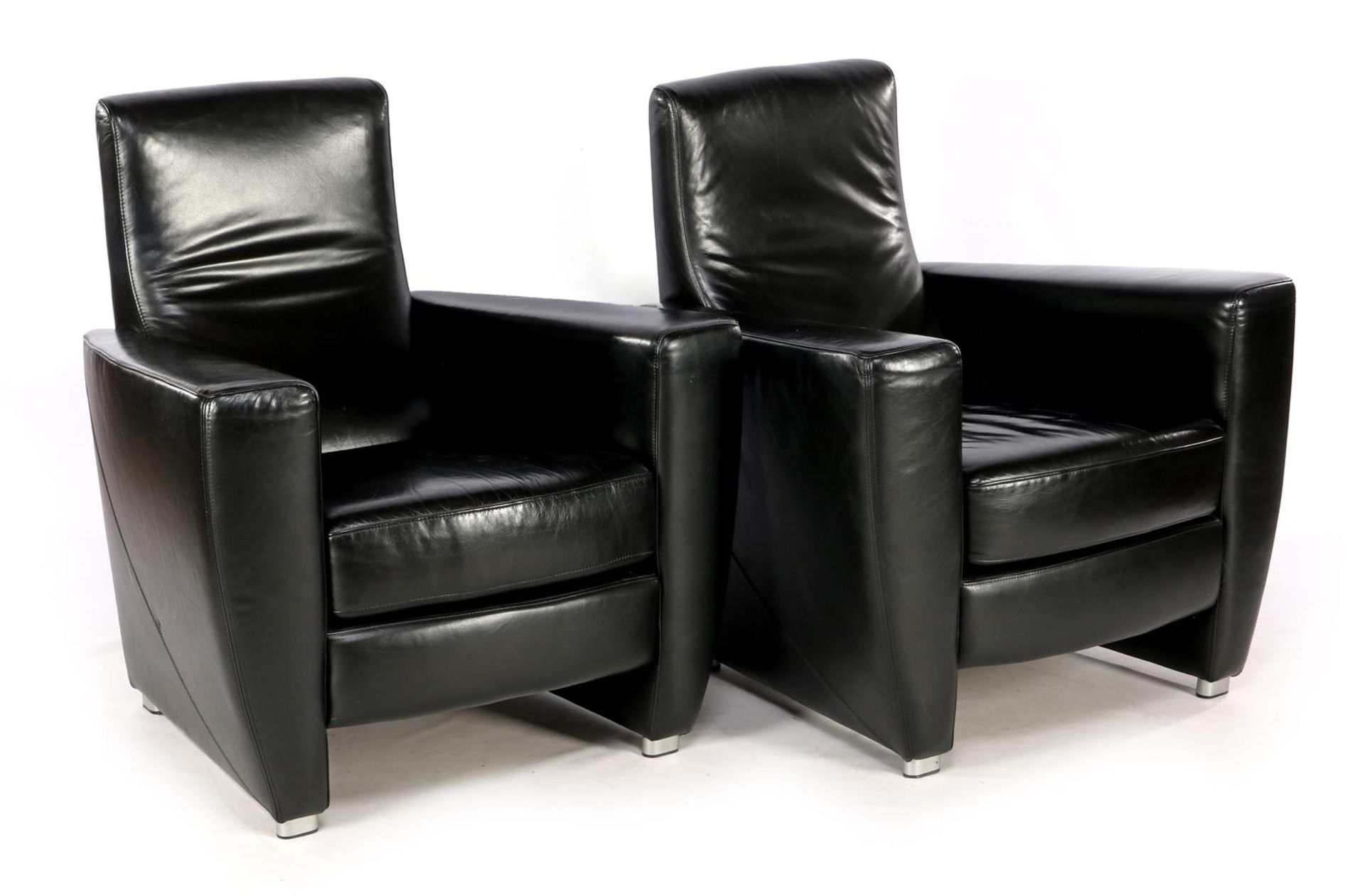 2 black leather armchairs of the brand Touche