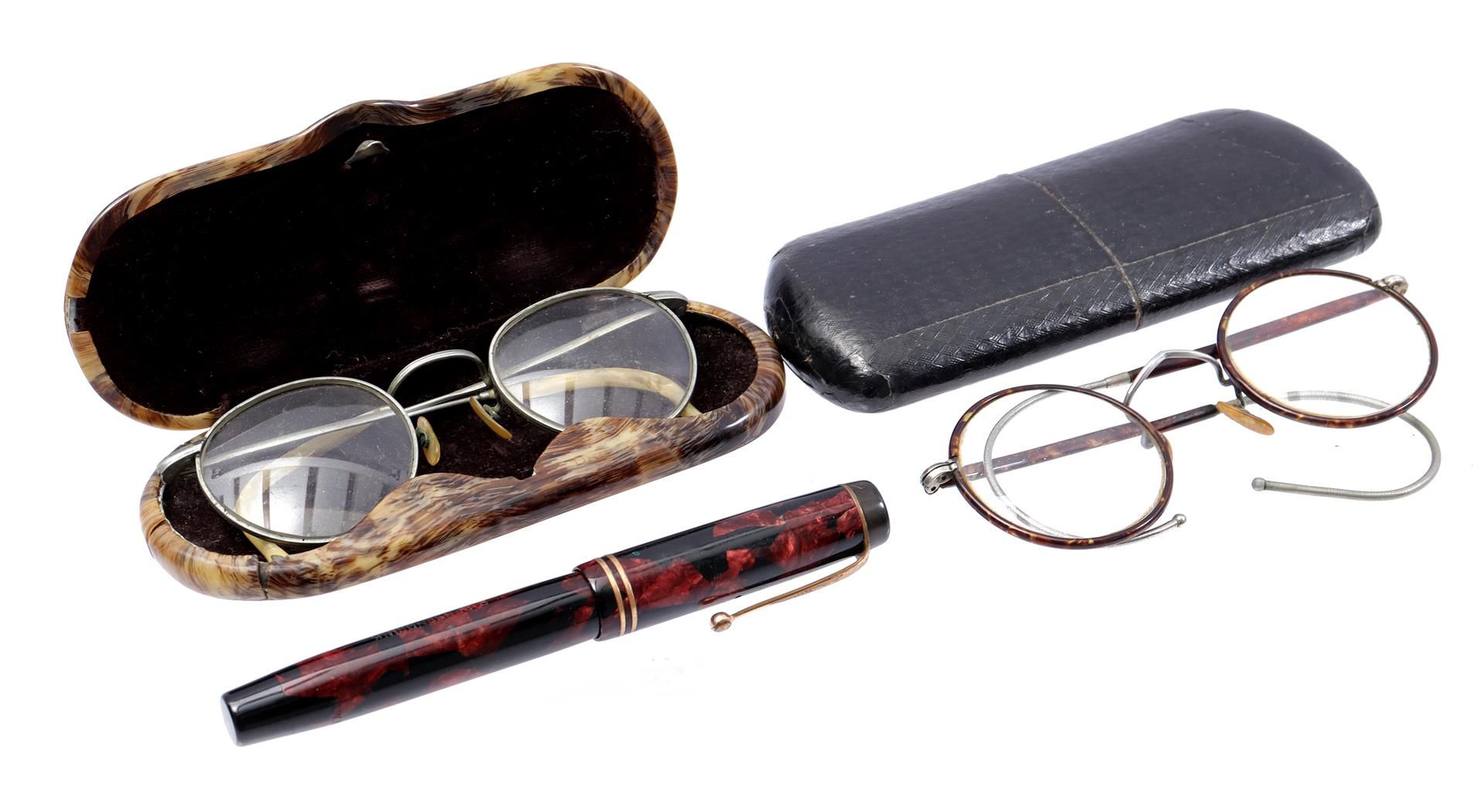 2 old glasses in case and a Parker Duofold fountain pen