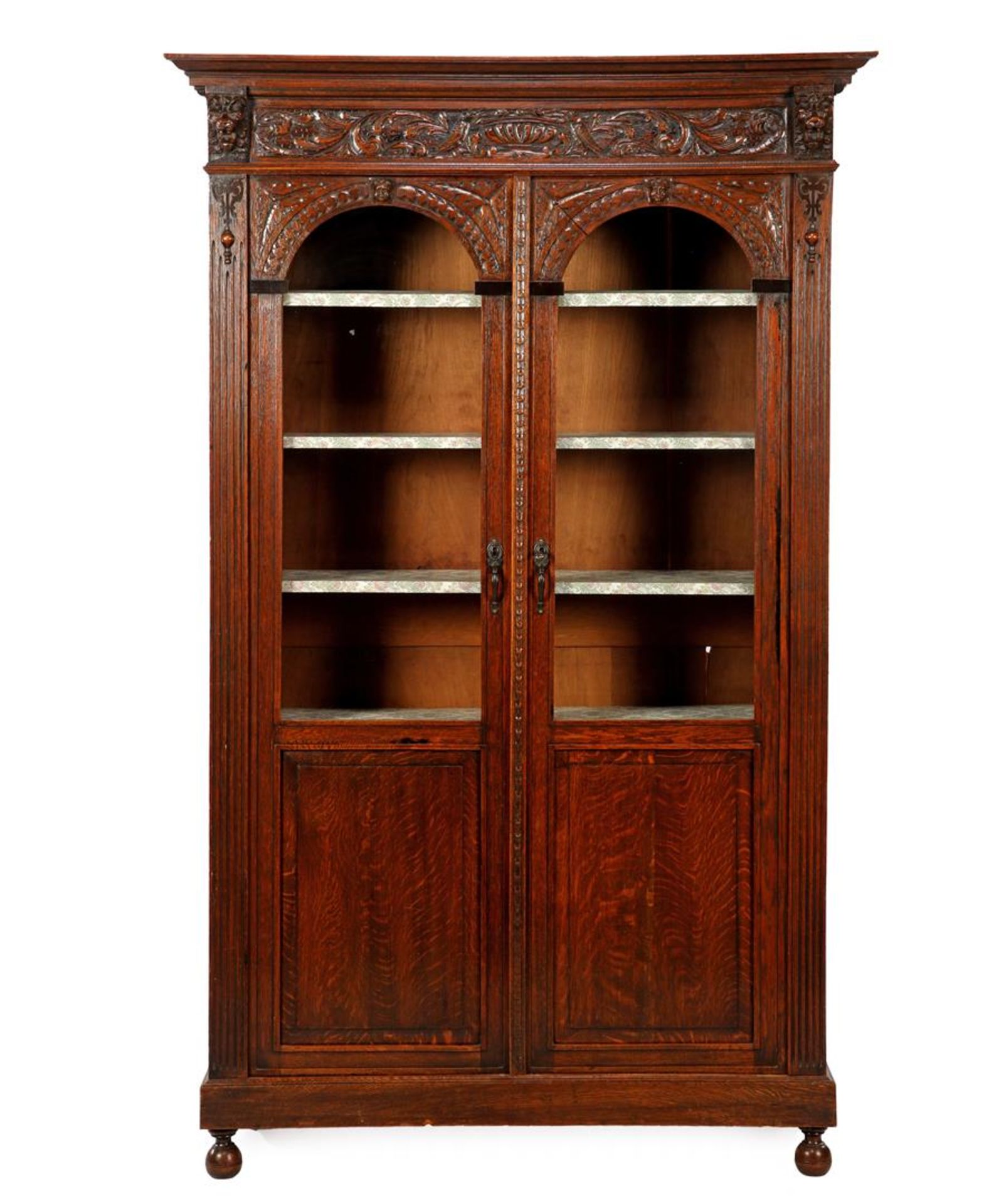 Oak fired display cabinet with straight hood rail, among others. lion heads