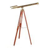 Brass telescope on wooden tripod after antique example