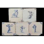 5 blue and white colored earthenware tiles
