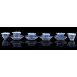 4 octagonal porcelain cups and saucers decorated with lotus flowers and patterns