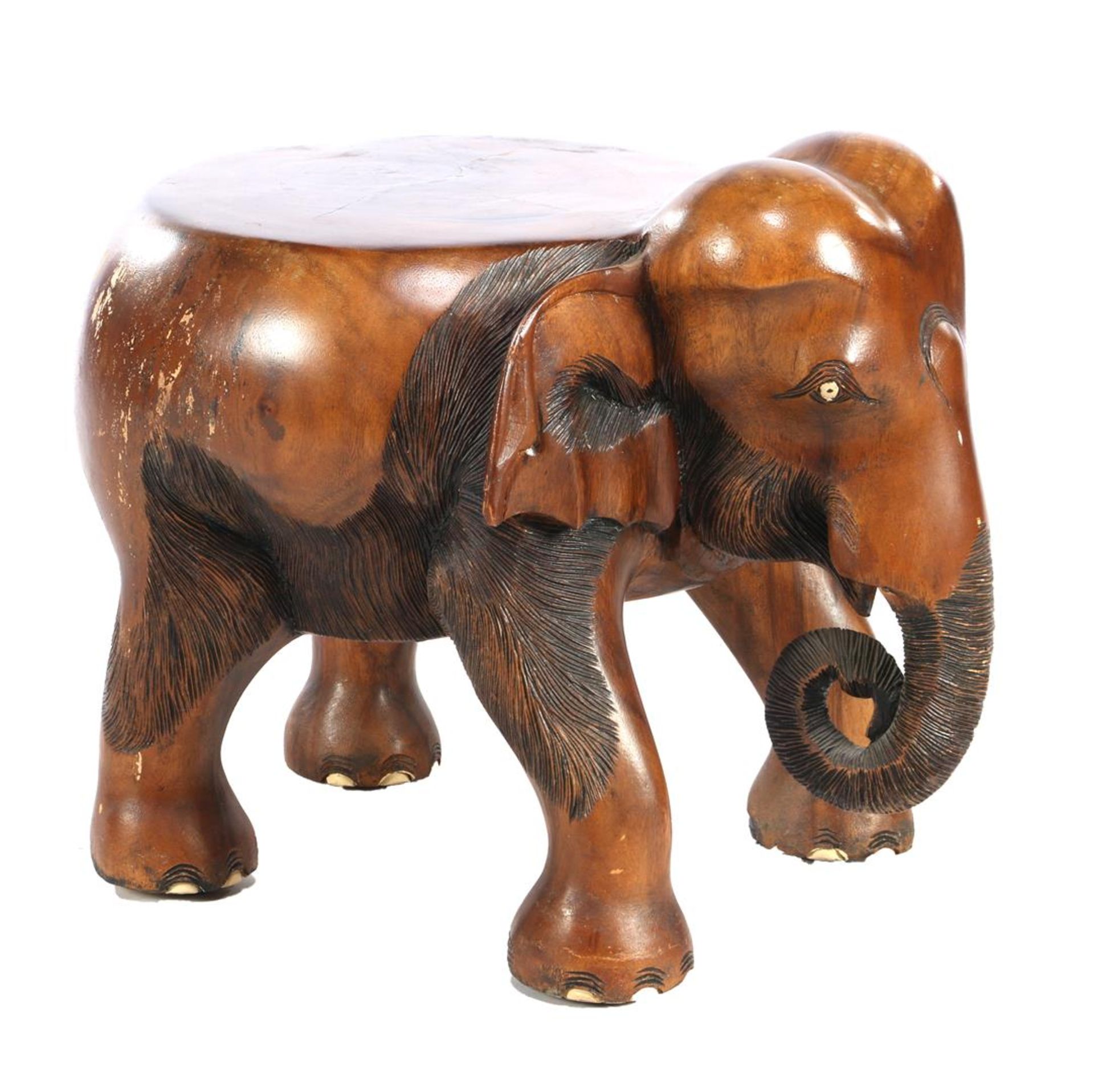 Asian wooden stool in the shape of an elephant