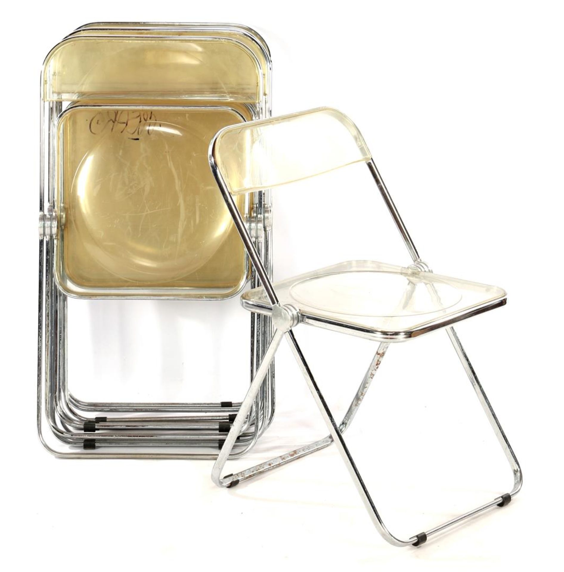 7 plastic folding chairs with chrome-plated metal edge