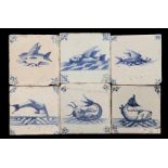 6 blue and white colored earthenware tiles