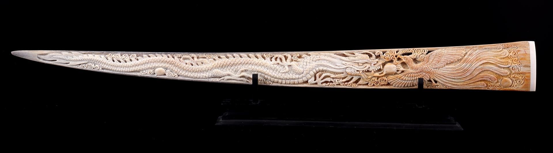 Swordfish tusk with finely hand-carved figure of the dragon