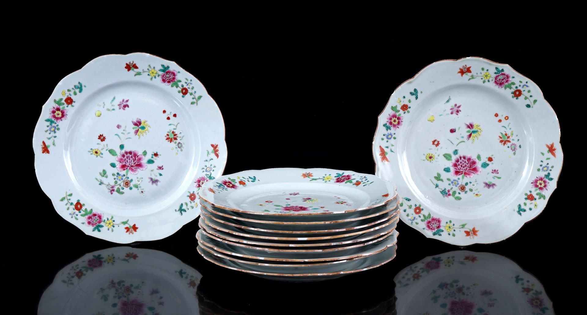 11 Famille Rose porcelain dishes with contoured rim and polychrome flower decor