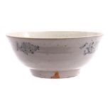 Glazed earthenware bowl with under decoration of flowers and fish