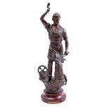 Zamak statue of a blacksmith