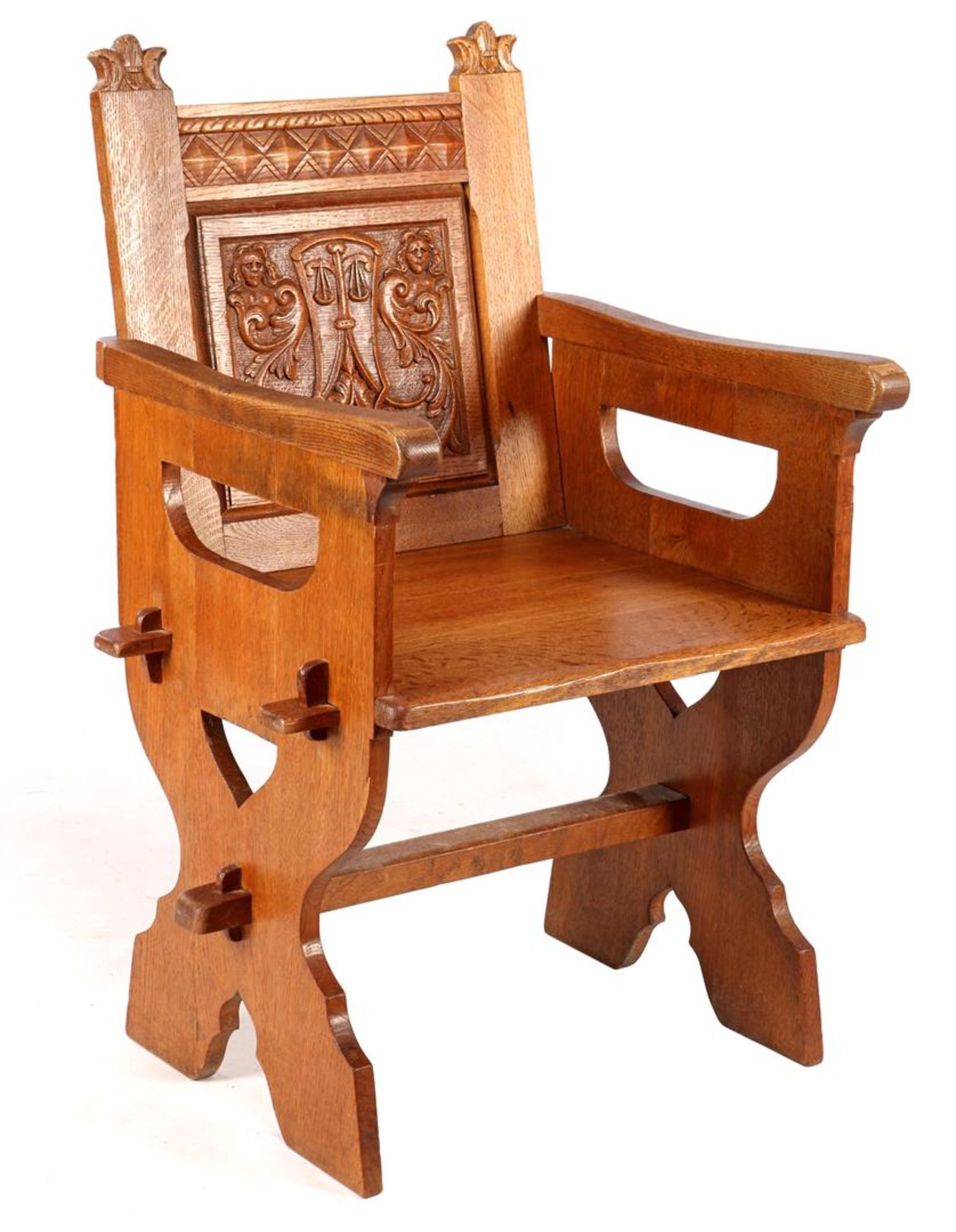 Oak armchair with decorated backrest
