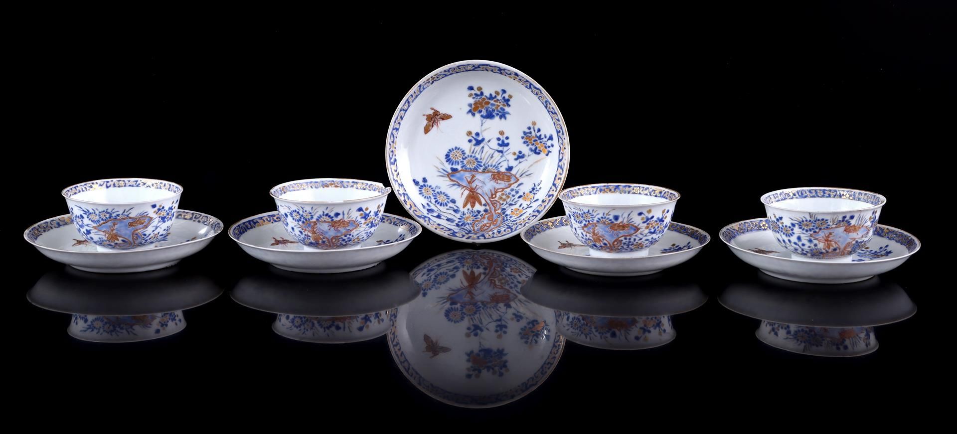 Porcelain cups and saucers with rare blue gold decoration of a butterfly