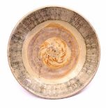 Glazed earthenware dish with under decoration