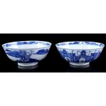 2 porcelain bowls with blue and white decor of a landscape