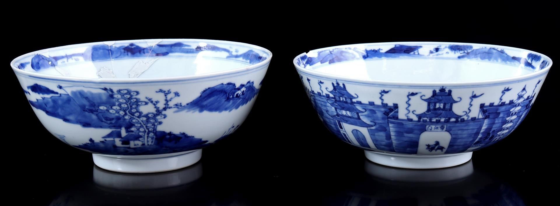 2 porcelain bowls with blue and white decor of a landscape