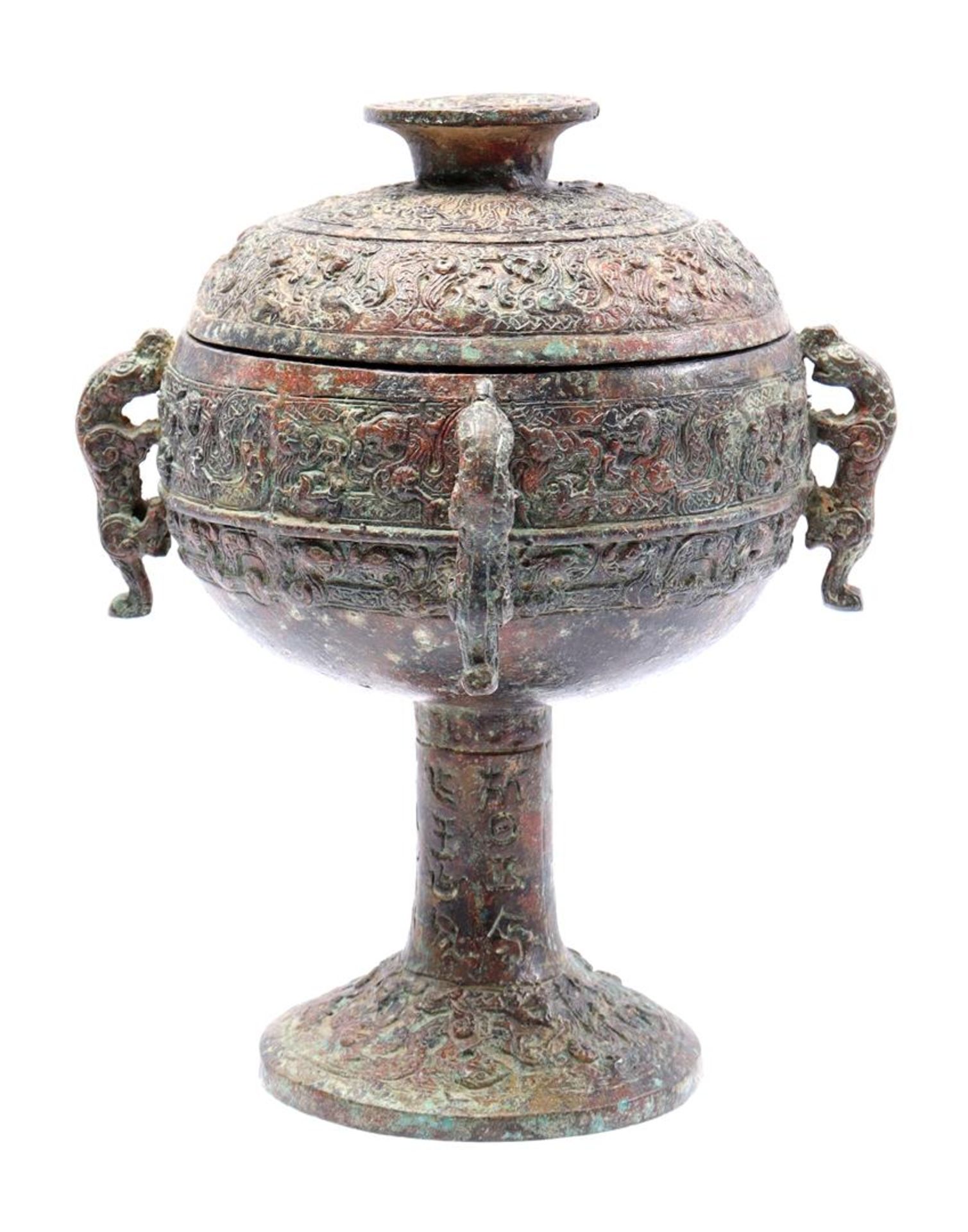 Bronze wine mortar with richly carved decoration and 4 handles