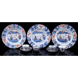 3 porcelain dishes with Imari decor of buildings in a mountain landscape