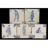 5 blue and white colored earthenware tiles