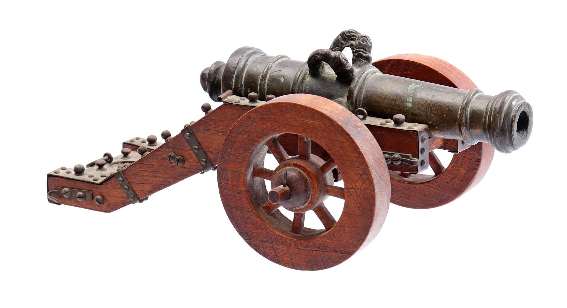 Bronze table gun in wooden gun carriage