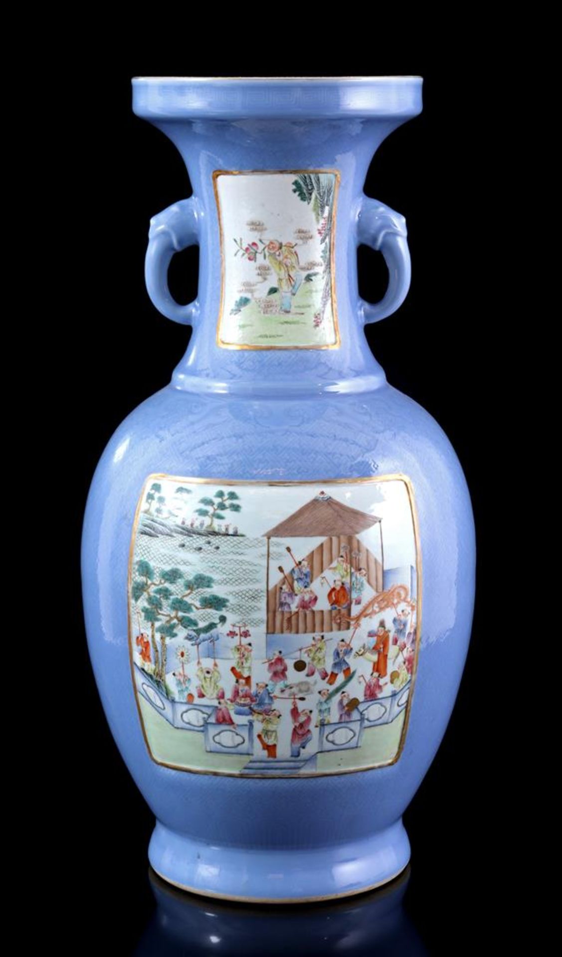 Porcelain monochrome light blue colored ear vase 