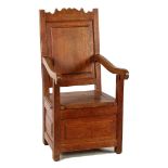 Oak armchair with storage space under seat, 19th century