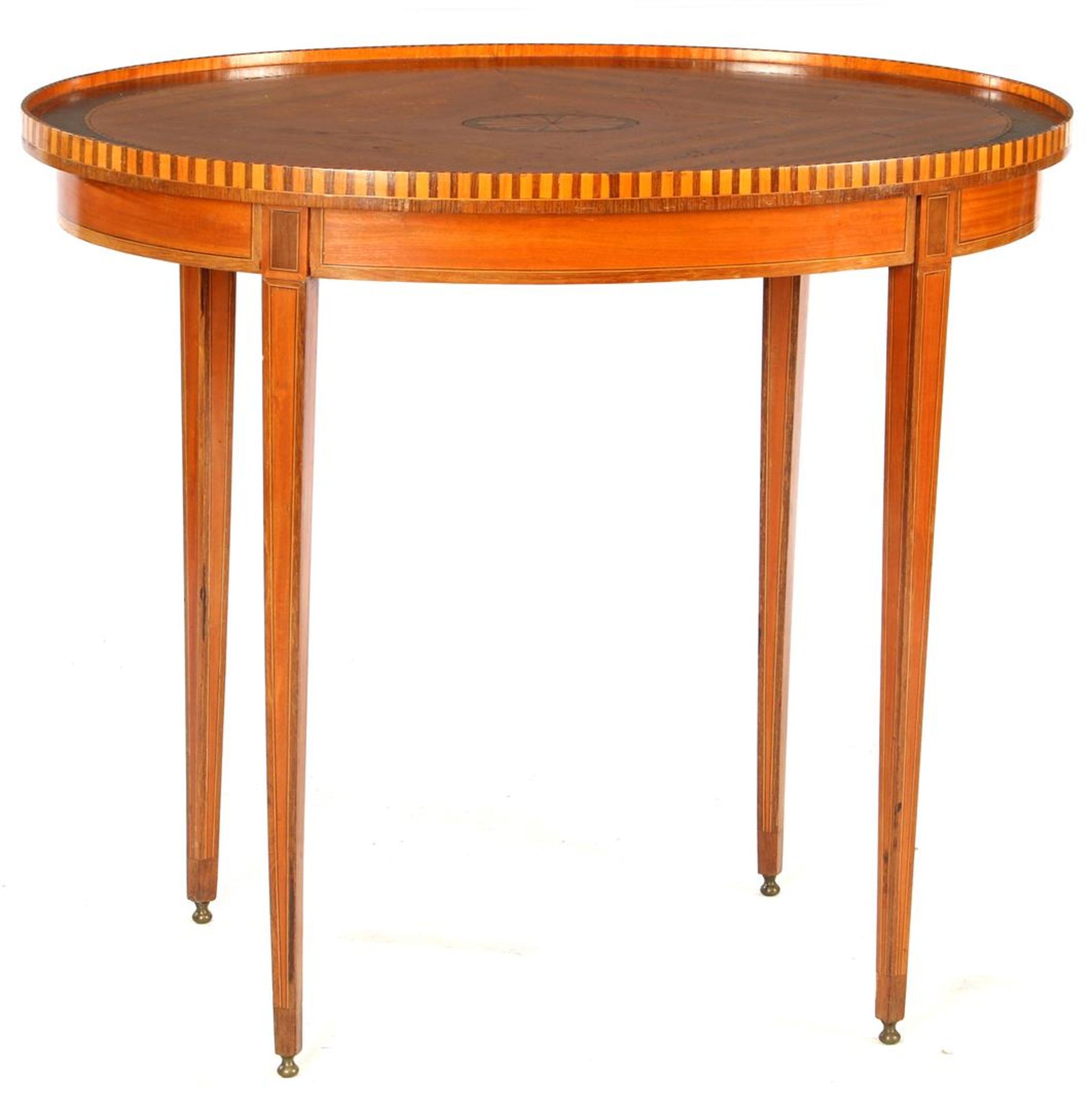 Oval oak table with several types of wood veneer 