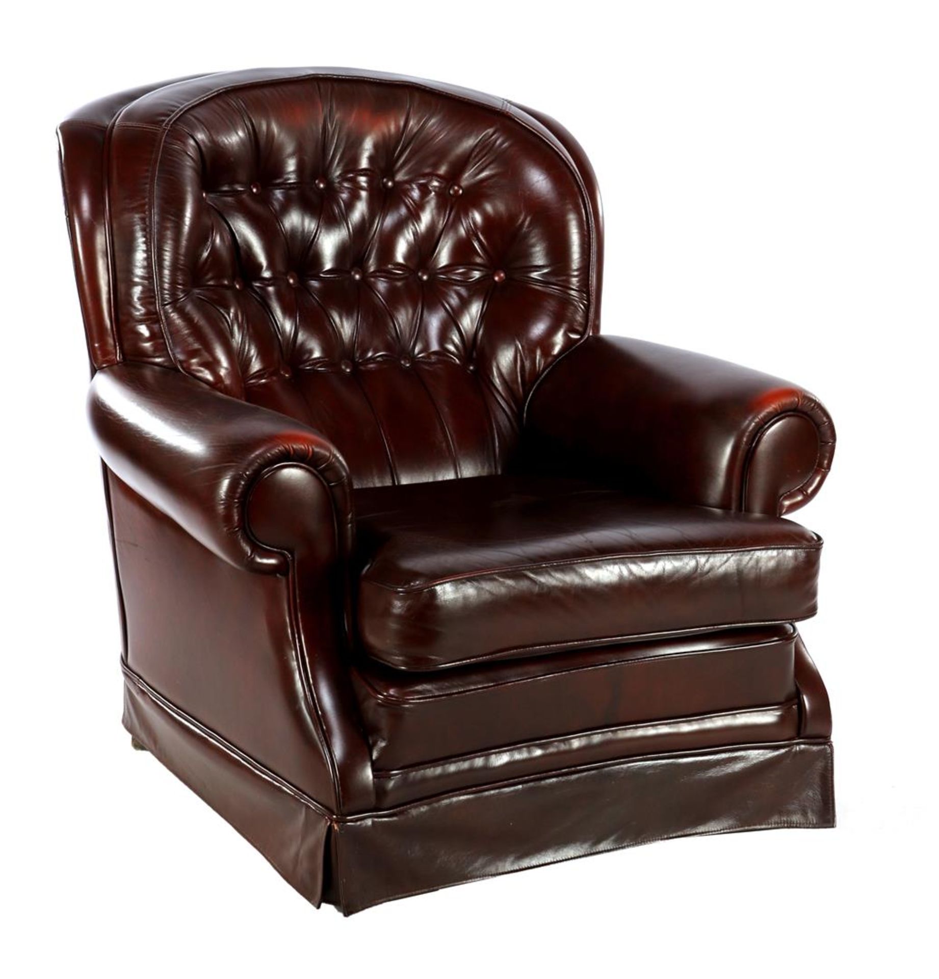 Brown leather armchair with padded back