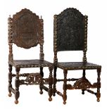 2 richly decorated chairs with richly decorated leather
