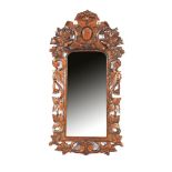 Mirror in oak richly decorated frame