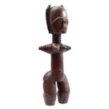 Wooden ceremonial statue of a woman