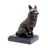 Bronze statue of a sitting fox or dog