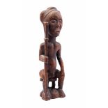 Ceremonial wooden figurine of a person