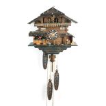 Cuckoo clock with playing mechanism