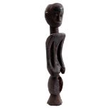 Wooden ceremonial statue