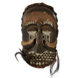 Wooden ceremonial mask with beard