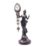 Bronze-coloured metal statue with Junghans clock