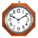 Octagonal school clock in oak case