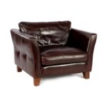 Brown leather love seat